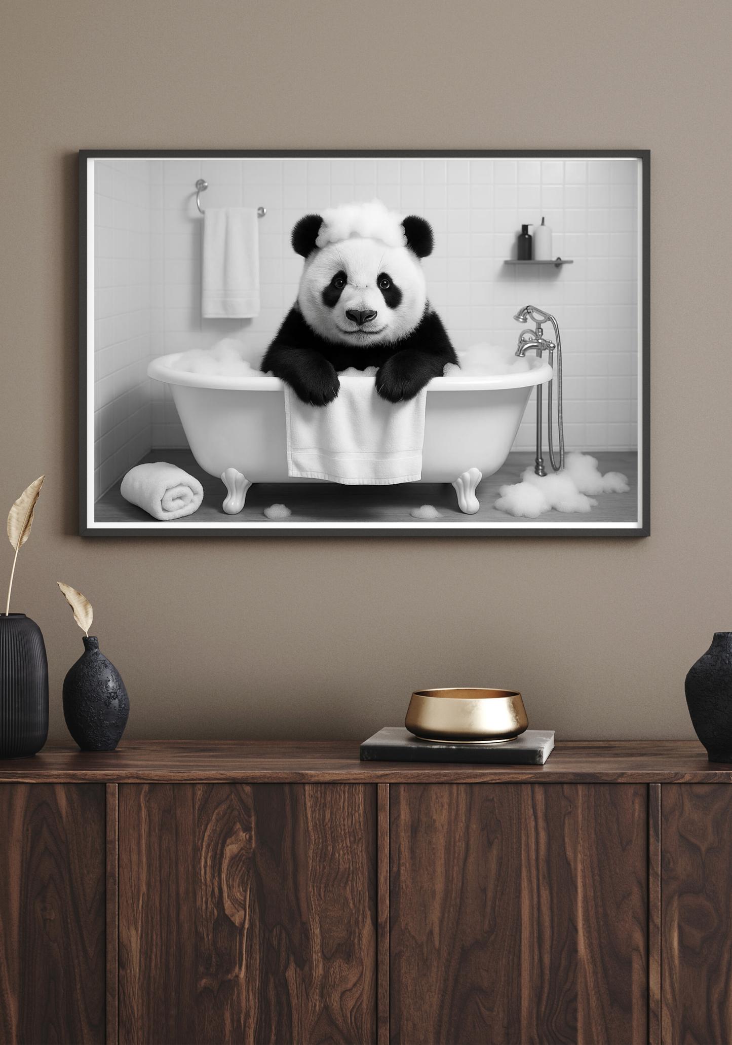 Framed artwork of a panda in a bathtub on a wall above a wooden cabinet.