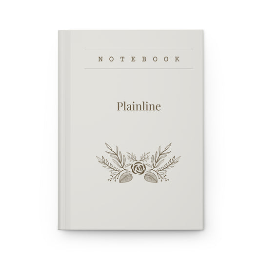 Floral notebook with 'Plainline' branding on the front cover in a white background.