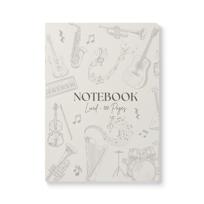Notebook with musical instrument illustrations on a white background