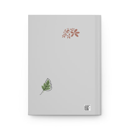 Gray notebook back cover with leaf and flower designs on a white background